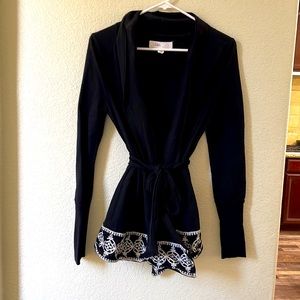 Wrap long top with very comfortable fabric. Great with jeans